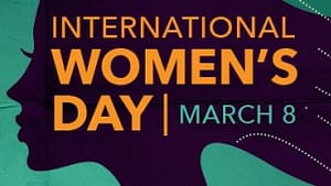 International Women's Day news feed image in black and neon colored green background and yellow colored lettering