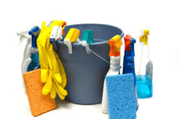 Blue bucket holding yellow gloves, orange and blue sponges, and other cleaning supplies