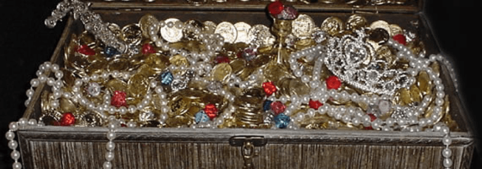 Box of gold coins, ruby colored stones and white pearl necklaces that must be stored properly to avoid moving day theft